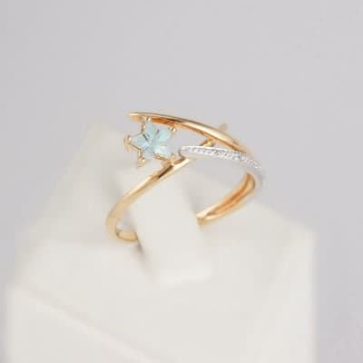 Золотое кольцо с топазом и бриллиантами Зірка